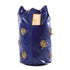 A cylindrical blue bag with 6 visible holes. Hay fills the bag and pokes out of the holes.