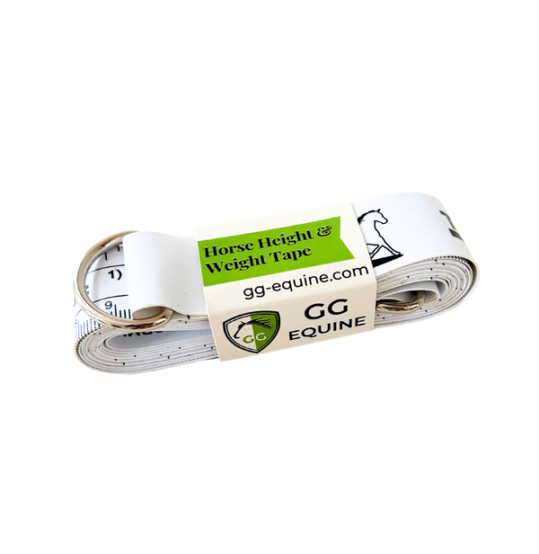 Flexible horse height and weight tape rolled up and bound by a cardboard wrap around the middle.