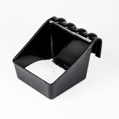 Loose salt and mineral feeder for grazing muzzles