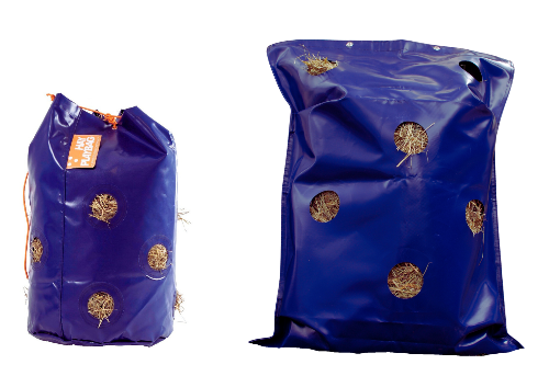 two blue hay bags on a white background