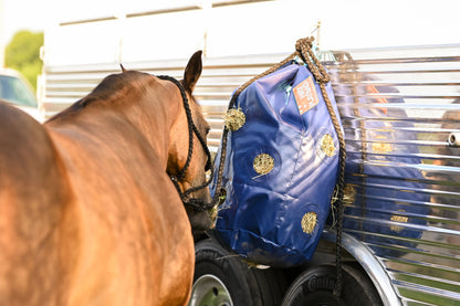 Durable hay bag for trailering horses