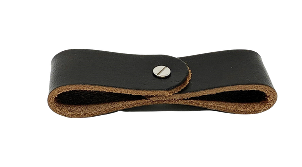 A small leather breakaway tap. It has a small Chicago screw holding the loop together at the center. 