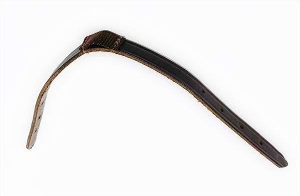 A leather crownpiece for a horse halter on a white background. 